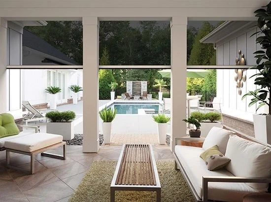 Screened covered patio looking out to a pool
